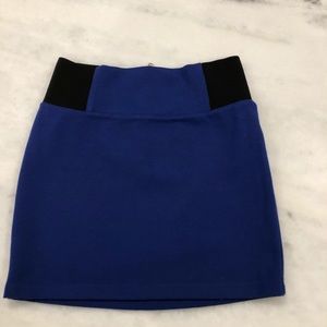 Royal Blue mini skirt that zips up back.